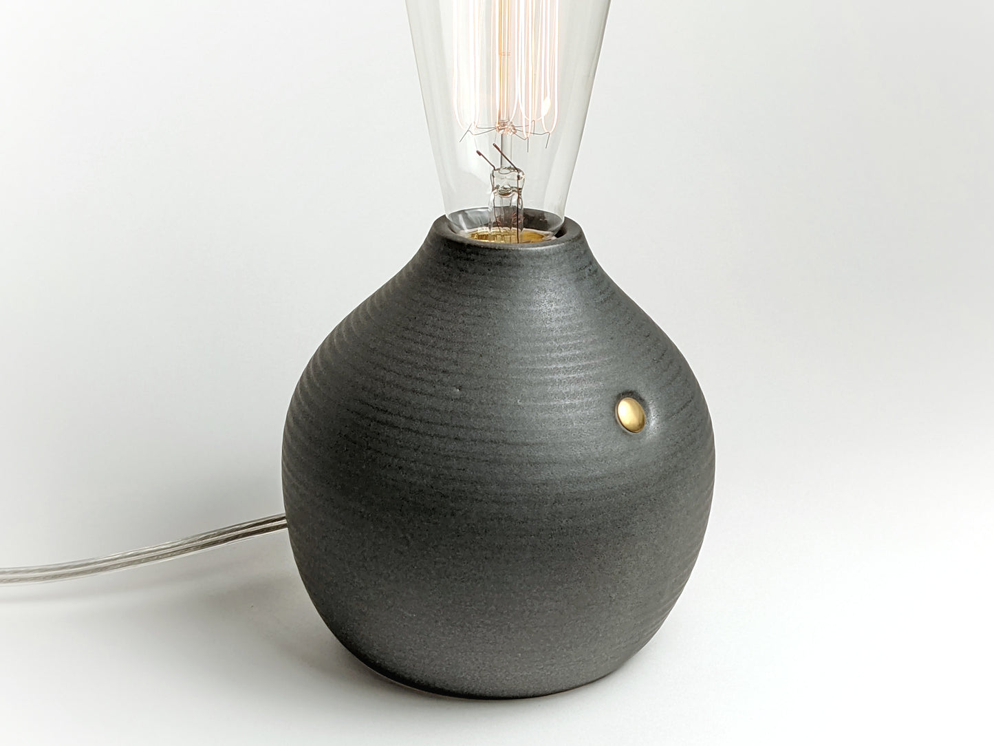 Matte black handcrafted stoneware Edison bulb lamp
