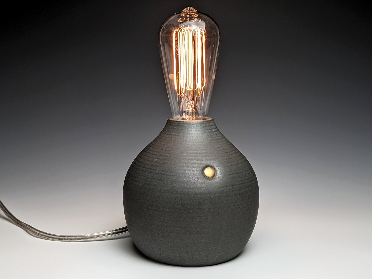 Matte black handcrafted stoneware Edison bulb lamp