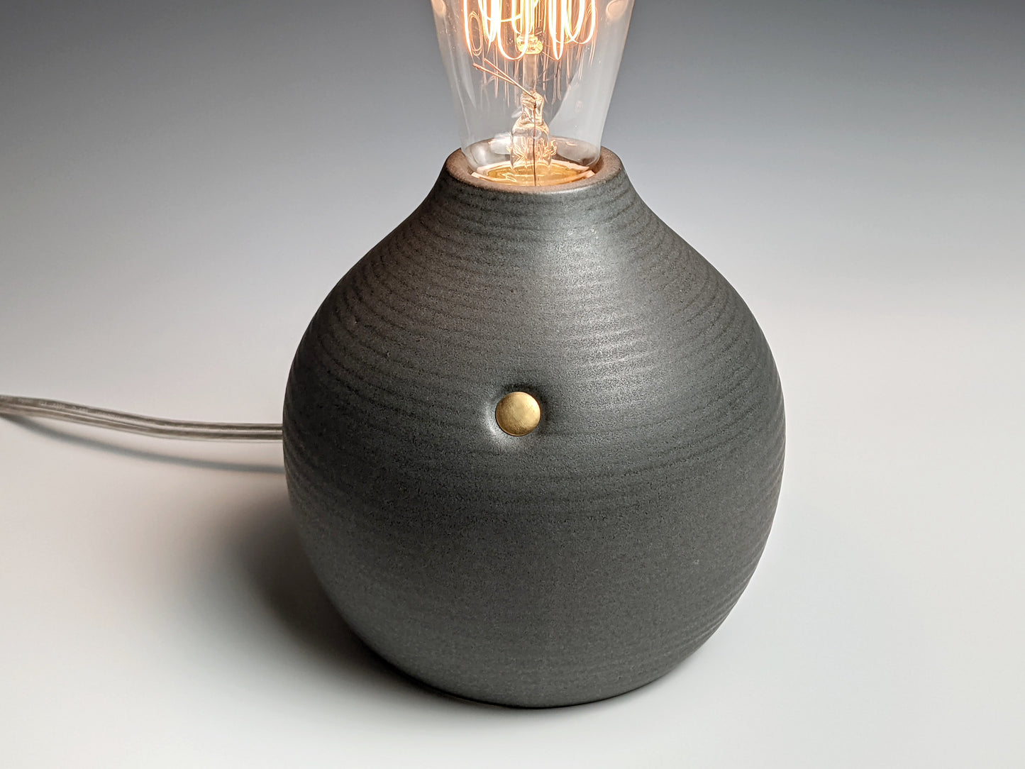 Matte black handcrafted stoneware Edison bulb lamp